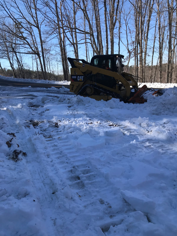 Removing snow - Stewart's Grading and Hauling